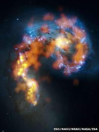 The Antennae (B. Saxton, (NRAO/AUI/NSF), ALMA (ESO/NAOJ/NRAO). Visible light image: the NASA/ESA Hubble Space Telescope)